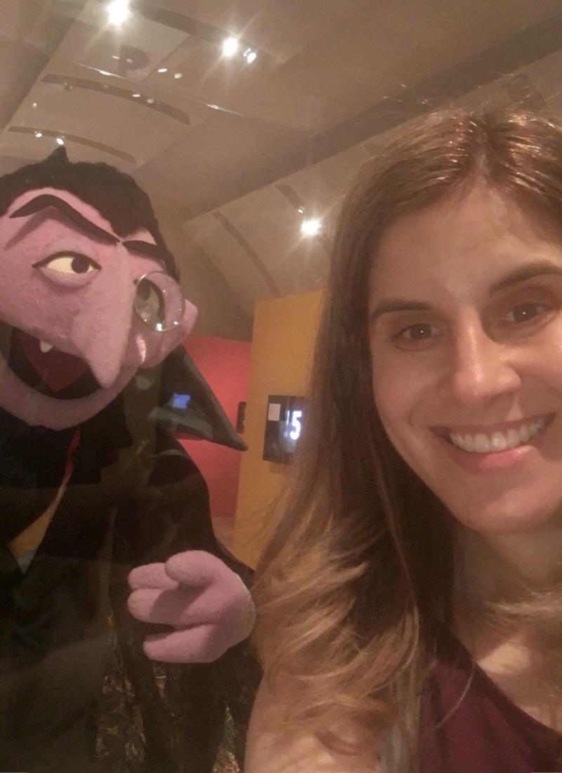 Headshot of Brenda with the Count from Sesame Street